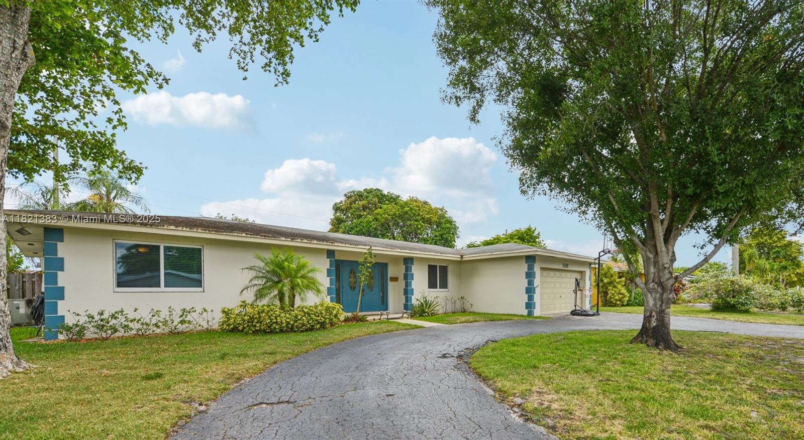 Charming 3-bedroom, 2-bath home with peaceful canal views, private pool, and no HOA! A spacious living room flows into the dining area, kitchen, and oversized family room. The kitchen features a convenient pass-through window to the screened patio, enhancing the home’s indoor-outdoor connection. The primary suite includes a walk-in closet and a private bath. Both bathrooms are designed as cabana-style, offering easy access to the backyard and patio. Hurricane impact windows, doors, and garage door provide added protection. The fully fenced yard offers privacy, boat parking, and a circular driveway. Located near top-rated schools, shopping, dining, and recreational parks, this home combines comfort, convenience, and a desirable South Florida lifestyle.
