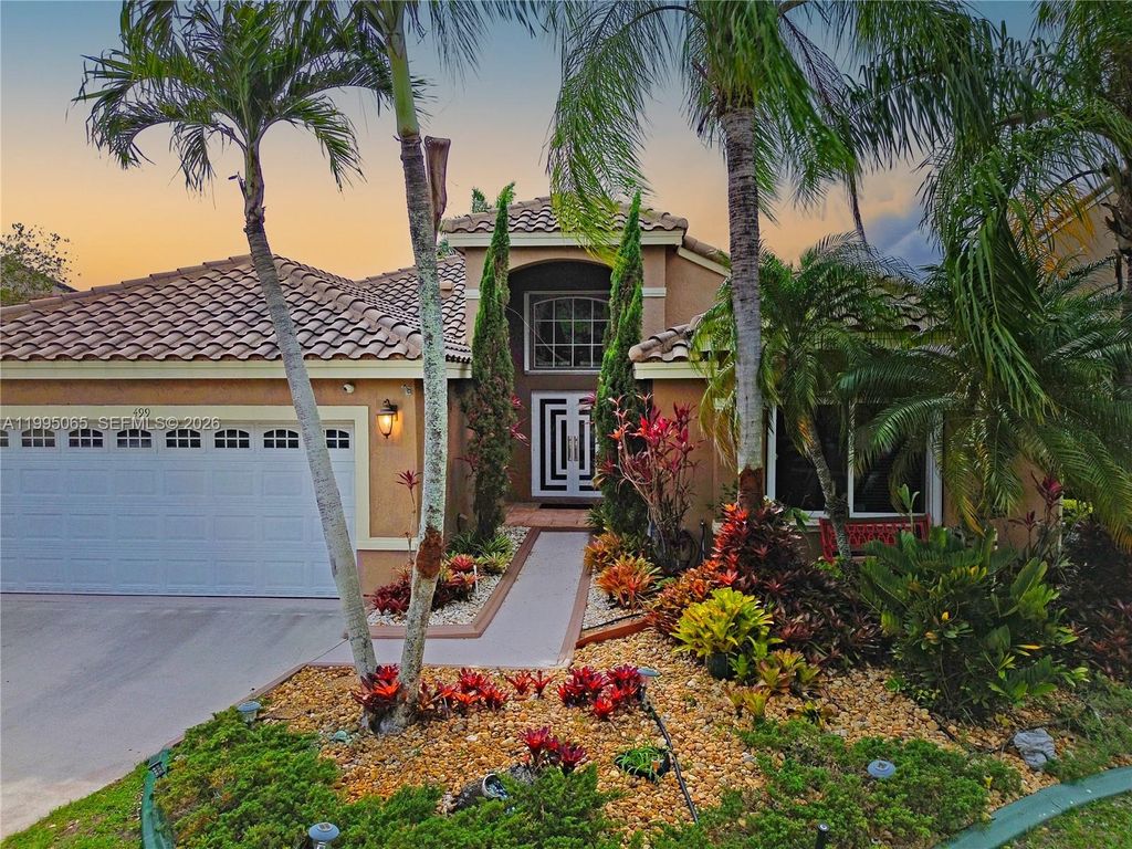 Photo of 499 Cambridge Ln, Weston, FL 33326 (MLS # A11995065)