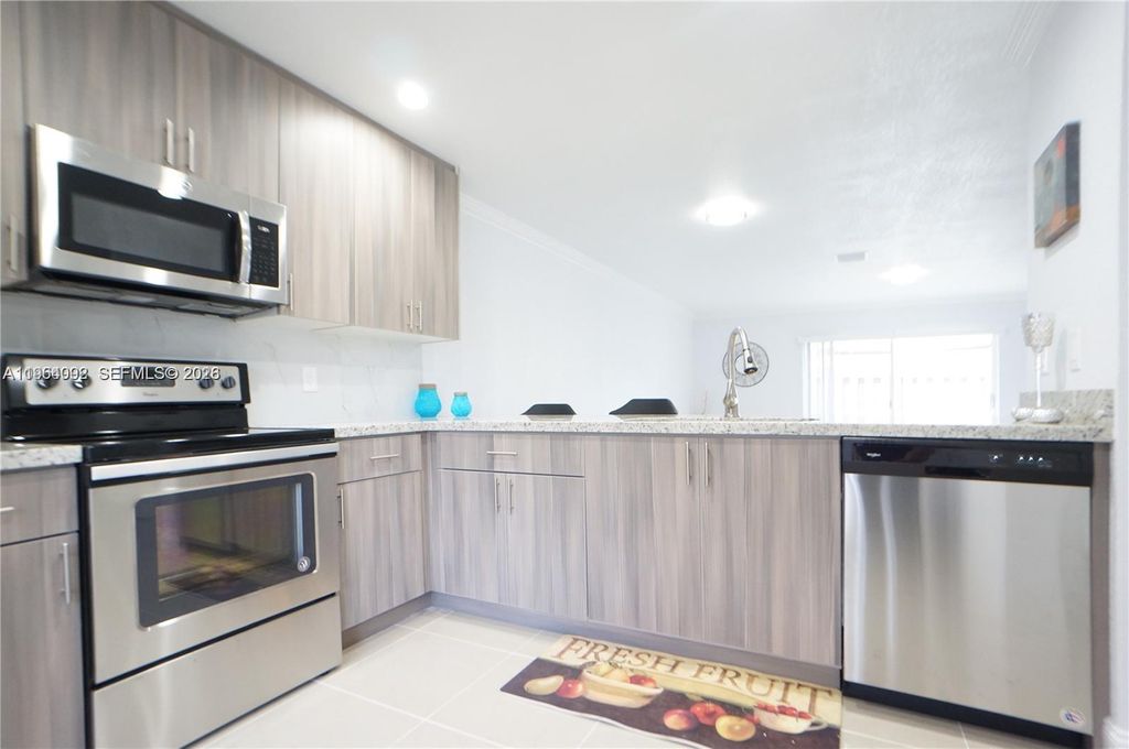 Photo of 610 NW 108th Ter #., Pembroke Pines, FL 33026 (MLS # A11964092)