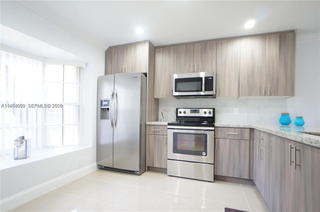 Photo of 610 NW 108th Ter #., Pembroke Pines, FL 33026 (MLS # A11964092)