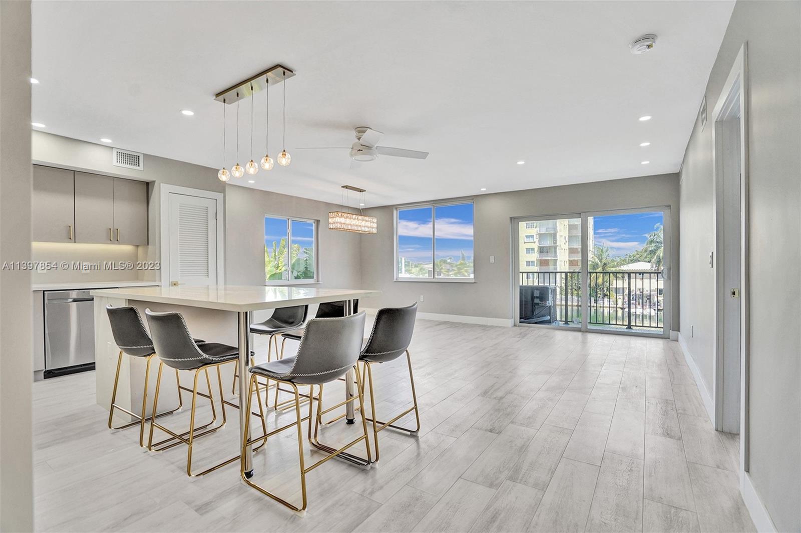 Great location, plus balcony views of the Intracoastal Waterway, and a wide canal leading to the bay and ocean! This appealing 1-bedroom, 1.5-bathroom completely renovated unit is found on the third floor of Creek Towers and Yacht Club in Miami Beach. The complex is an easy pedestrian distance to shopping and dining options, Biscayne Elementary, and three blocks from Ocean, recreational park in front of the building, North Shore Park three blocks away. Cross the threshold into a warm welcome that includes an open layout, natural light and stylish fixtures, and neutral decor. With ample room for food prep, the kitchen charms with natural light, fresh updates, premium appliances, granite counters, and an attractive layout.
