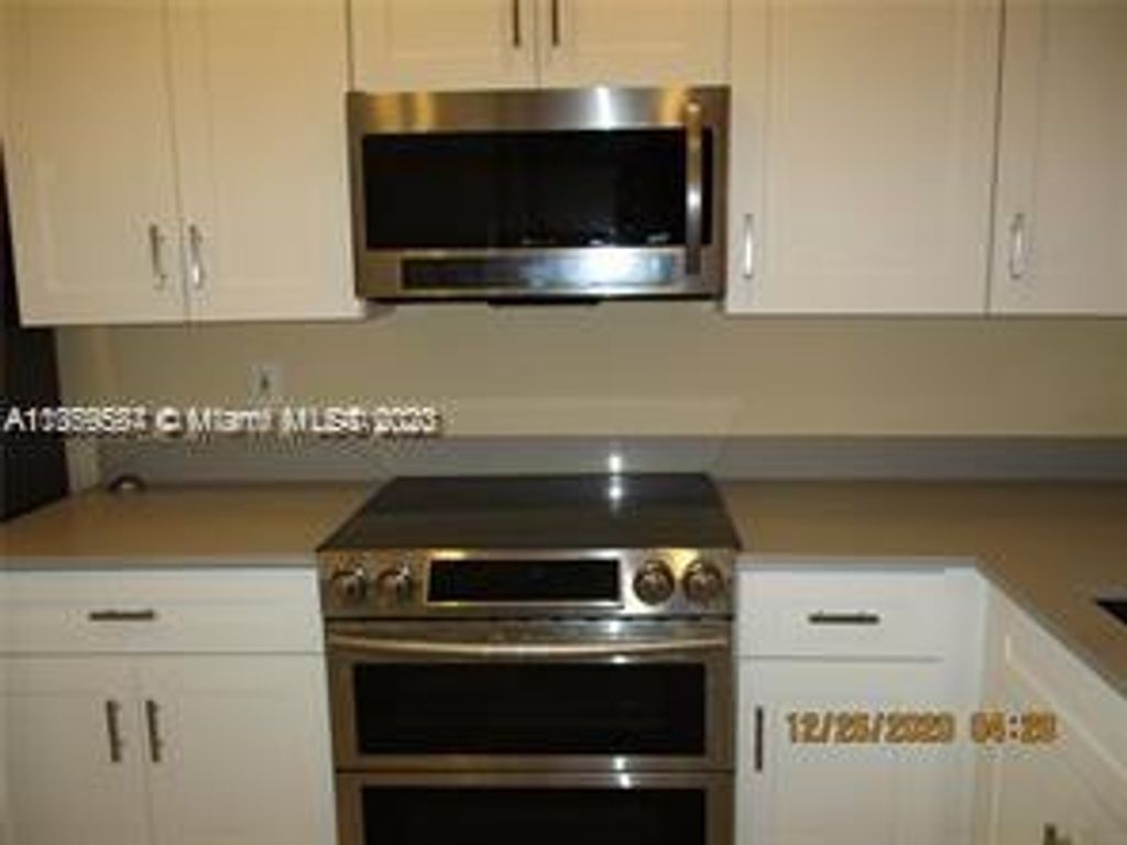 Photo of 424 SE 11th Ter #424, Dania Beach, FL 33004 (MLS # A11359587)