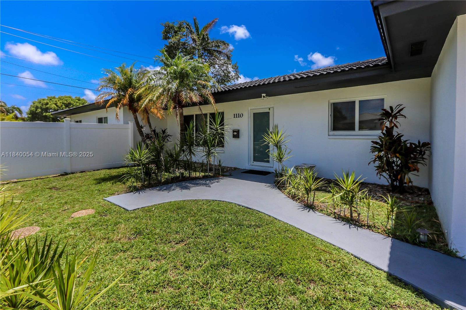 Welcome to this charming 4-bedroom + DEN, 3-bath, pool home for rent in the desirable Hollywood Lakes neighborhood. Situated on a large corner lot with full PVC privacy fencing, this home offers a spacious layout and a private backyard oasis perfect for relaxing or entertaining. The primary bathroom features a beautiful clawfoot tub and a separate walk-in shower. Enjoy the comfort of impact windows and doors, newer A/C units, and a large patio area ideal for outdoor living. A separate mother-in-law suite with a screened porch provides added flexibility for guests or extended family. Conveniently located near beaches, lakes, the Intracoastal, schools, parks, shopping, dining, houses of worship, and major highways, this home combines comfort, style, and unbeatable location.