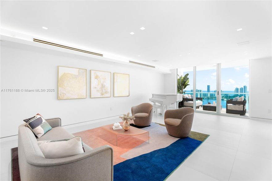 This newly renovated 4-bedroom, 4.5-bathroom + den flow-through residence at Peninsula Two offers luxury living on the penthouse floor, with unobstructed Intracoastal and ocean views from the expansive balcony. Designed with custom Egger millwork and Italian porcelain flooring, the home features an Italkraft Grigio Bromo kitchen with Fenix finishes, plus Wolf and Sub-Zero appliances. The master suite includes a private balcony, porcelain slab finishes, custom Italkraft cabinetry, his-and-her bathrooms, and bespoke closets. Crafted by a top New York developer, this residence includes 5-star amenities such as valet service, three parking spaces, two pools, two gyms, a hot tub, sauna, spa, BBQ area, tennis courts, a playground, Williams Island Country Club for ultimate convenience & comfort.