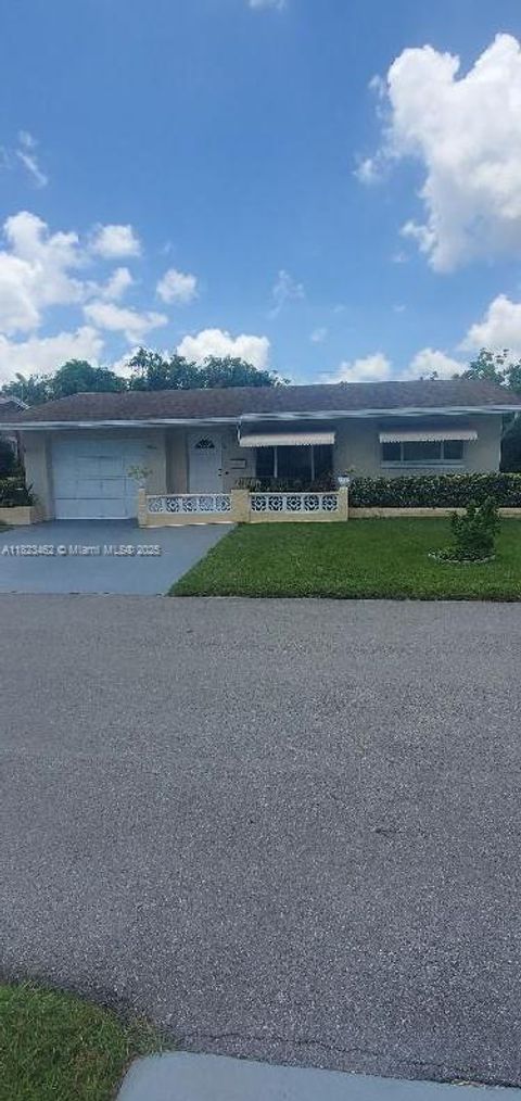 Photo of 4926 NW 48th Ave, Tamarac, FL 33319 (MLS # A11823462)