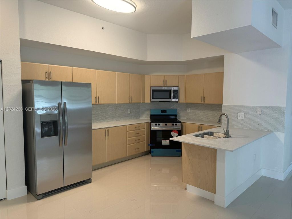 Photo of 2851 Riverside Dr #205-N, Coral Springs, FL 33065 (MLS # A12024260)