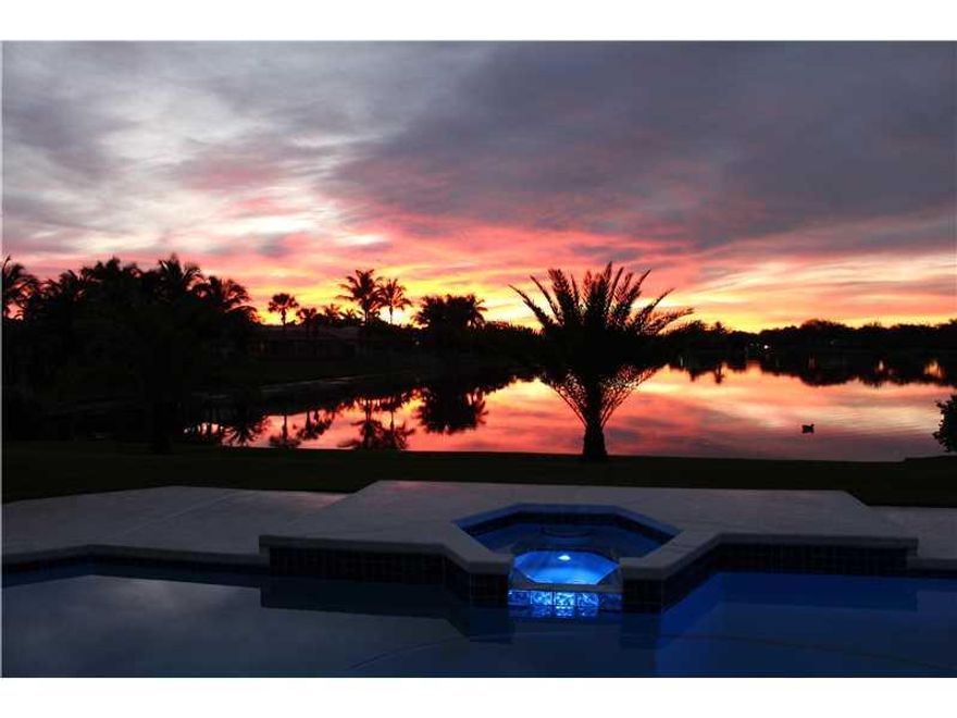 Stunning 4/2.5 dream home in Cooper City's prestigious gated community of Country Glen. Amazing Long lake views from almost every room. Split bedroom/open floor plan. New SS appliances, granite kitchen, new Impact glass front door/Front windows/cabana bat h door & accordion shutters, new gutters, new SuperBlue Diamond Brite in pool w/lifetime guarantee, new pool Pump, new sprinkler system, new high efficiency lighting inside/out, new blinds/toilets/ceiling fans. No front OR back neighbors! A++ schools!
