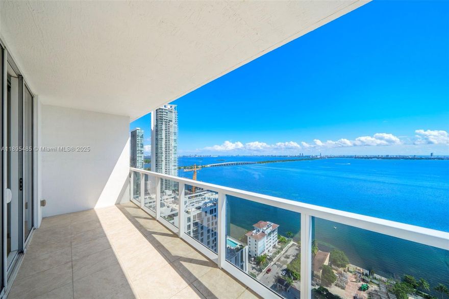 Bright and spacious southeast corner residence on the 31st floor of Bay House. The most desirable line in the building w/ breathtaking water views!! This 3-bed, 2.5-bath home features a modern European kitchen with pantry/laundry area, wraparound balcony off the living area plus a private balcony in the primary suite. The primary bath offers dual sinks, while two. bedrooms share a Jack-and-Jill bath with dual sinks and bathtub/shower. 3 parking spaces available, 2 included in list price. Bay House offers resort-style amenities: pool deck with cabanas, BBQ area, fitness center, and yoga studio. Perfectly situated in Edgewater with Starbucks and Whole Foods within walking distance, and an easy drive to the beach and airport. Minutes to Design District, Downtown Miami, and Brickell.
