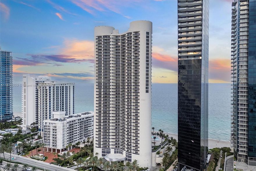 Stunning, fully renovated and redesigned 2BD/2BA residence in a premier oceanfront building in Sunny Isles. All rooms face the ocean, with a private balcony offering breathtaking views. Features include marble and wood flooring, European-style open kitchen with Miele appliances, wine cooler, custom closets, Italian doors, and automatic window treatments. The spacious primary suite boasts a Jacuzzi tub and custom walk-in closet. Enjoy resort-style amenities: pool, beach service, spa, gym, fitness classes, beachfront restaurant, 24/7 security, valet, and assigned parking.