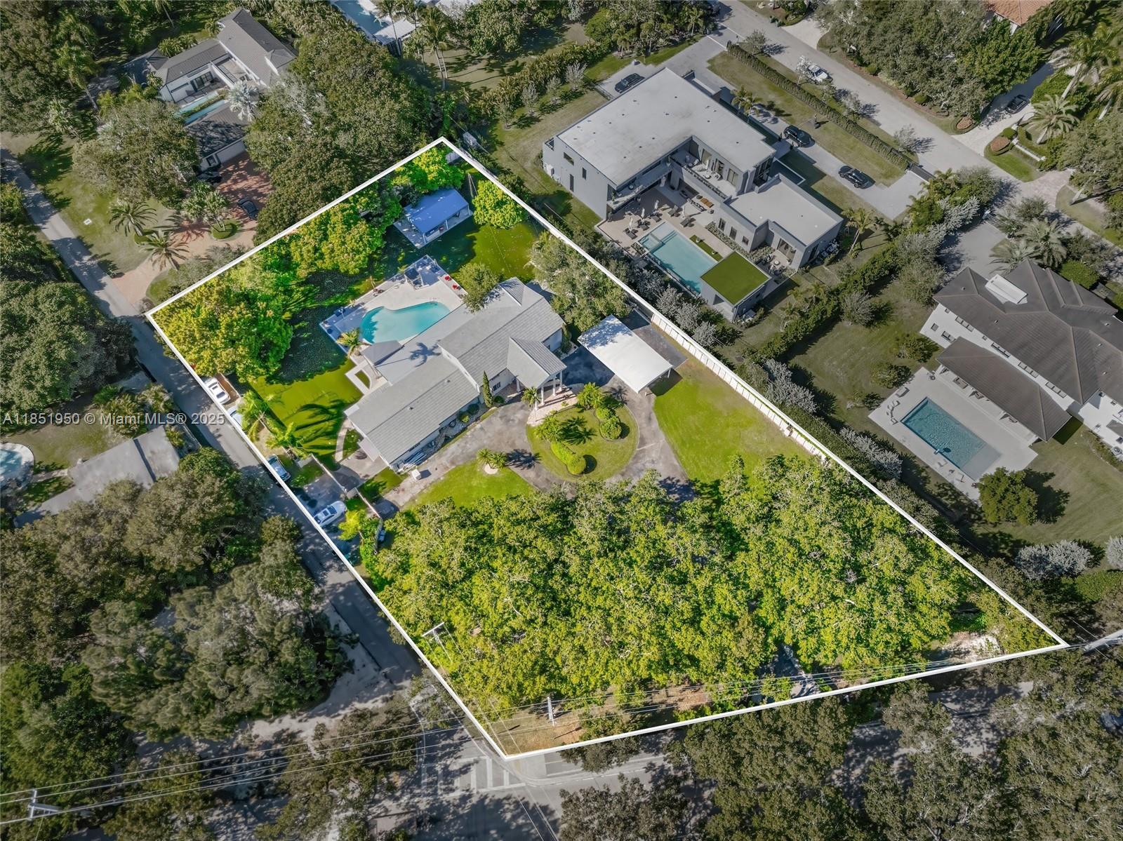 Listed Under Appraisal Value! Rare, gated corner lot spanning over an acre in Pinecrest with a beautiful Colonial Revival residence already in place. Seven bedrooms, six and a half baths, fully renovated chef’s kitchen with butler’s pantry, new roof, and impact windows. Prime land value plus a timeless home. Perfect for enjoying now or redeveloping later. Opportunities like this, where prime land and a fully finished home come together, are rare in Pinecrest. Schedule your private tour today and experience the unique combination of timeless architecture, modern updates, and unmatched land value.