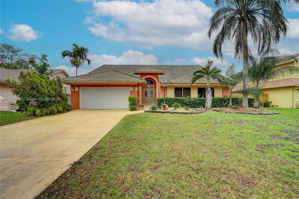 Photo of 7120 NW 44th Ln, Coconut Creek, FL 33073 (MLS # A11504059)