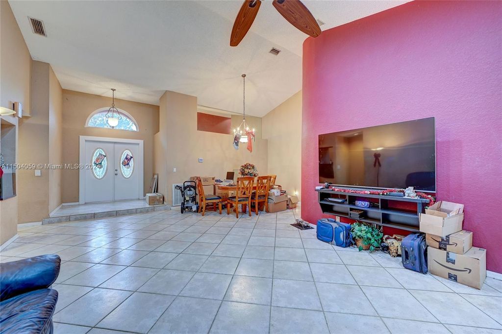 Photo of 7120 NW 44th Ln, Coconut Creek, FL 33073 (MLS # A11504059)