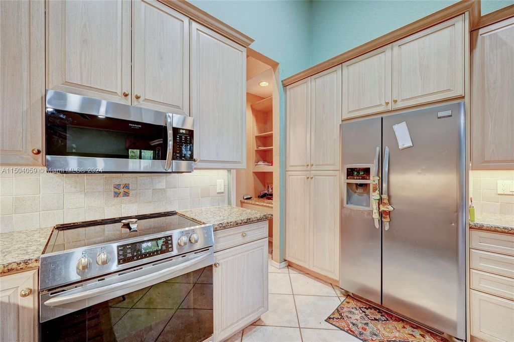 Photo of 7120 NW 44th Ln, Coconut Creek, FL 33073 (MLS # A11504059)