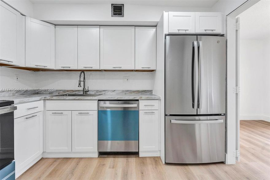 Discover this magnificent, spacious 2-bedroom, 2-bathroom corner unit, offering stunning views from the living room and master bedroom, including breathtaking sunsets. Recently remodeled, this condo features a sleek, modern kitchen with brand-new stainless-steel appliances, a new water heater, and updated bathroom vanities. Enjoy contemporary flooring throughout, new blinds new light fixtures, and a freshly painted interior. The master bedroom includes a walk-in closet, and the unit boasts ample storage space. Experience fabulous amenities such as 24-hour security, tennis courts, a lush tropical pool, a clubhouse, and a library. Located in an excellent area close to shopping and dining, this condo offers vibrant South Florida living at its best. Don’t miss this ideal opportunity!
