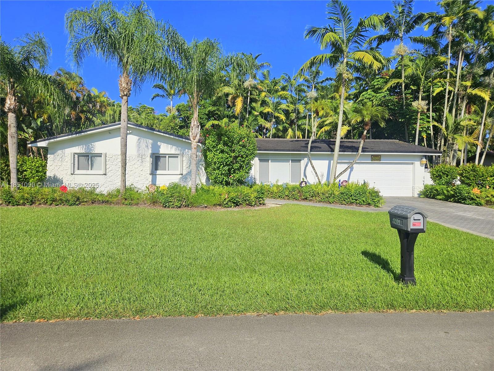 NO HOA! CORNER LOT Single-Family Home with a pool and 2-car Garage in desirable Kendall Neighborhood! NEW ROOF! HURRICANE IMPACT WINDOWS! HOME GENERATOR! NEAR TOP-RATED SCHOOLS! ST. JOHN NEUMAN SCHOOL AND LEEWOOD K-8! Features tile flooring throughout. Screened covered patio perfect for entertaining with access to the kitchen. Primary bedroom with en-suite bathroom and access to the patio! Lush, manicured landscaping surrounds the property, offering a serene outdoor ambiance.