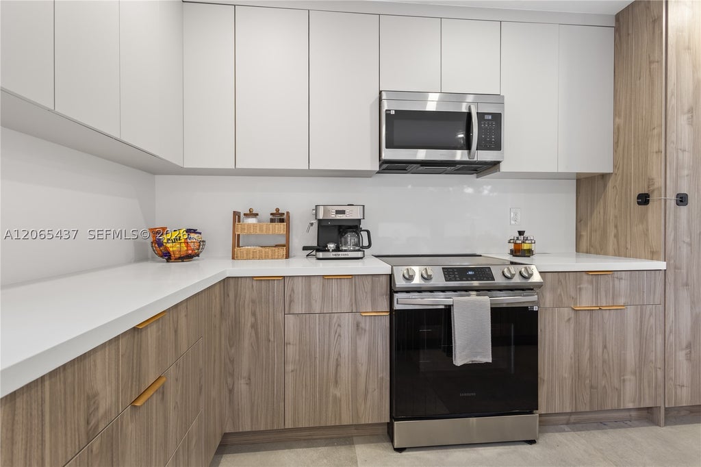 Photo of 1042 NW 13th St, Fort Lauderdale, FL 33311 (MLS # A12065437)