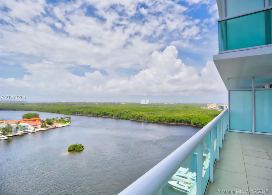 Priced $200,000 below other same type units!!!  MUST SELL  Direct Bay and Ocean Views from this Luxurious Townhome at 400 Sunny Isles. Live in splendor in this 2 Bedroom plus over sized Den with 3 full bathrooms with European Cabinetry & Stainless Steel Appliances, Spacious Layout, Large Terrace, New Construction with many amenities including tennis court, infinity edge pool, spa, spacious grounds, private marina & Membership to Private Beach Club on the Ocean, Water sport Activities. Minutes to the Beach, Aventura Mall, places of worship and so much more!