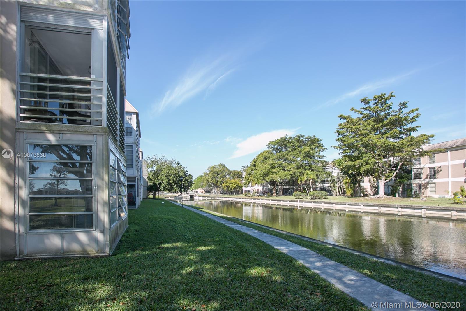 Corner 2 bedroom 2 bathroom first floor condo with beautiful canal views located in the All-Ages community of Sands Point! Property will painted and carpets remove.