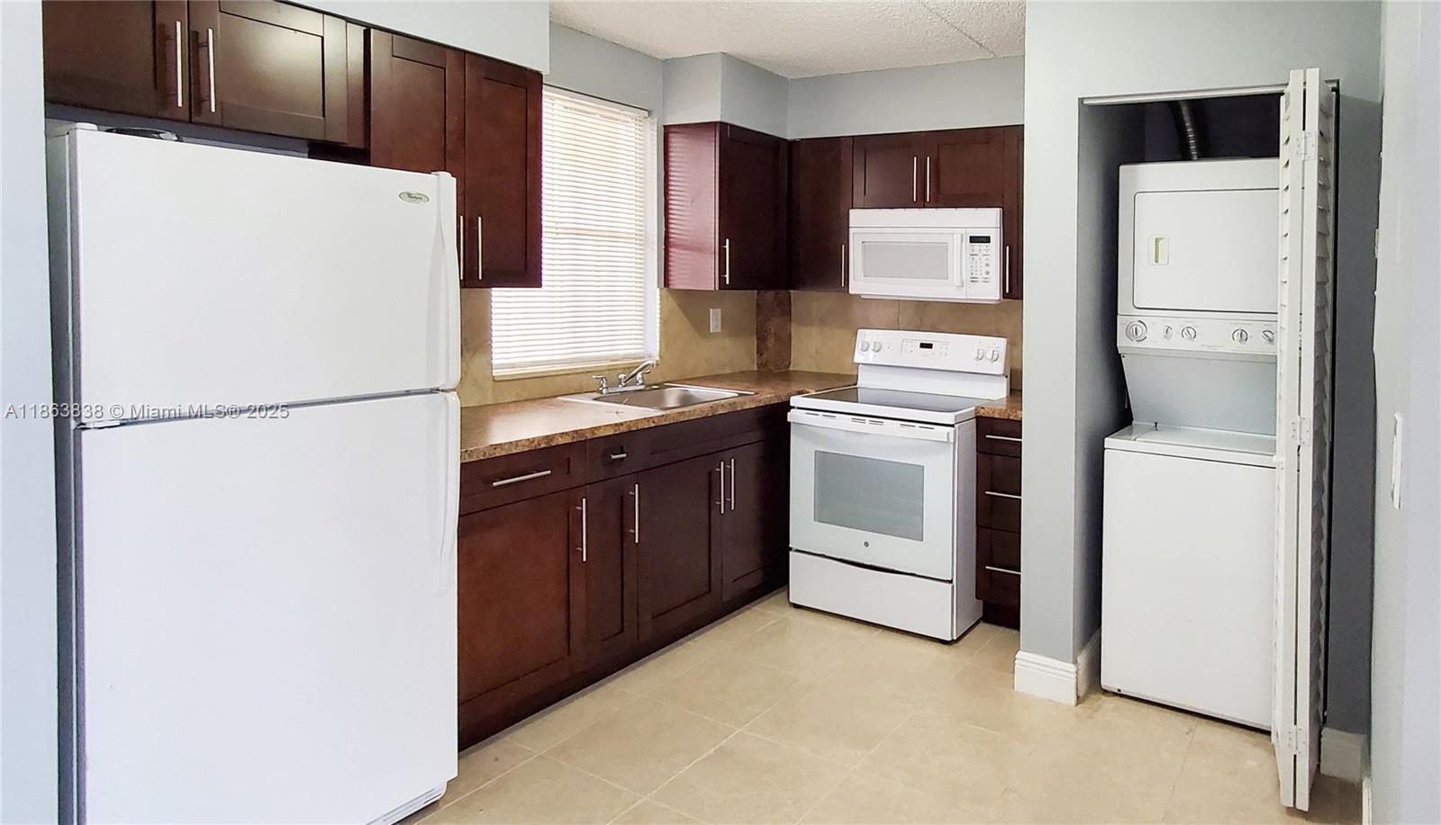 For rent: a beautiful, spacious, and recently remodeled 1-bedroom, 1-bath condo on the 3rd floor in the well-maintained Mirassou community, close to the Country Club. This apartment features fresh paint, a renovated kitchen and bathroom, tiled floors, a new AC unit, and a new water heater. It also includes a washer and dryer. Enjoy easy access to major highways (Palmetto, I-75, and Turnpike) and ample parking. Please note that pets are not allowed.