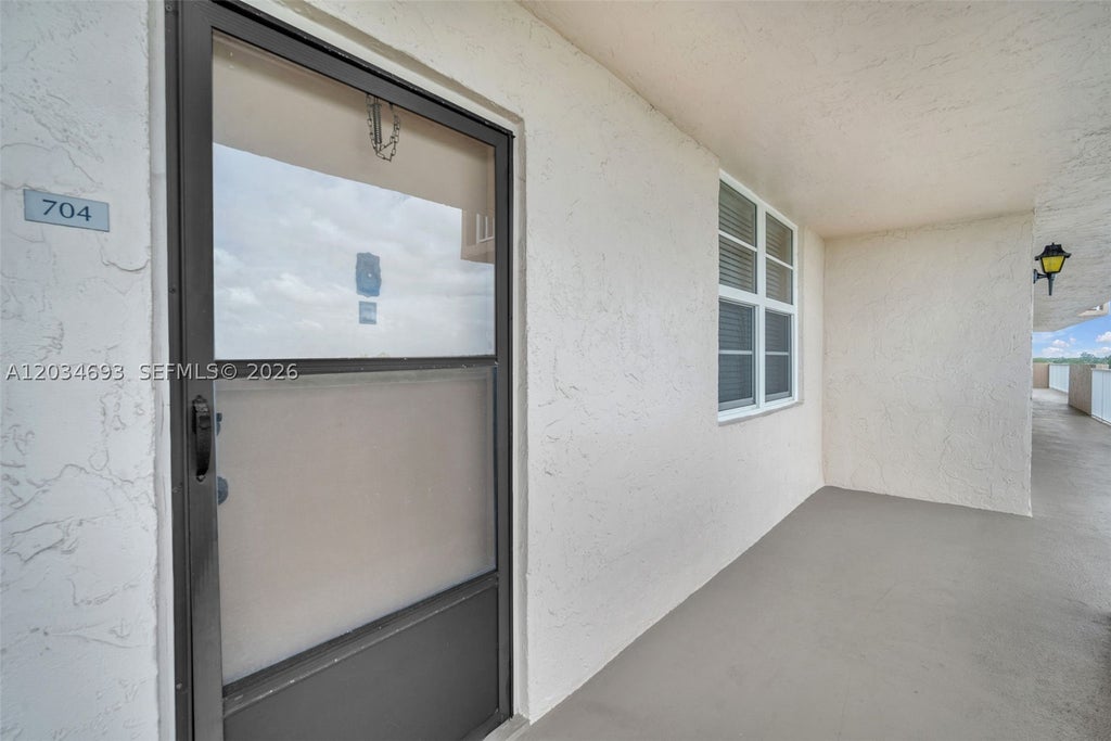 Photo of 250 Jacaranda Dr #704, Plantation, FL 33324 (MLS # A12034693)