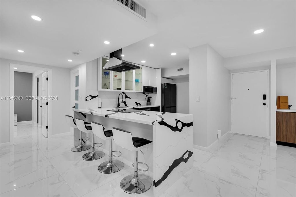 Photo of 3800 Hillcrest Dr #203, Hollywood, FL 33021 (MLS # A11953968)