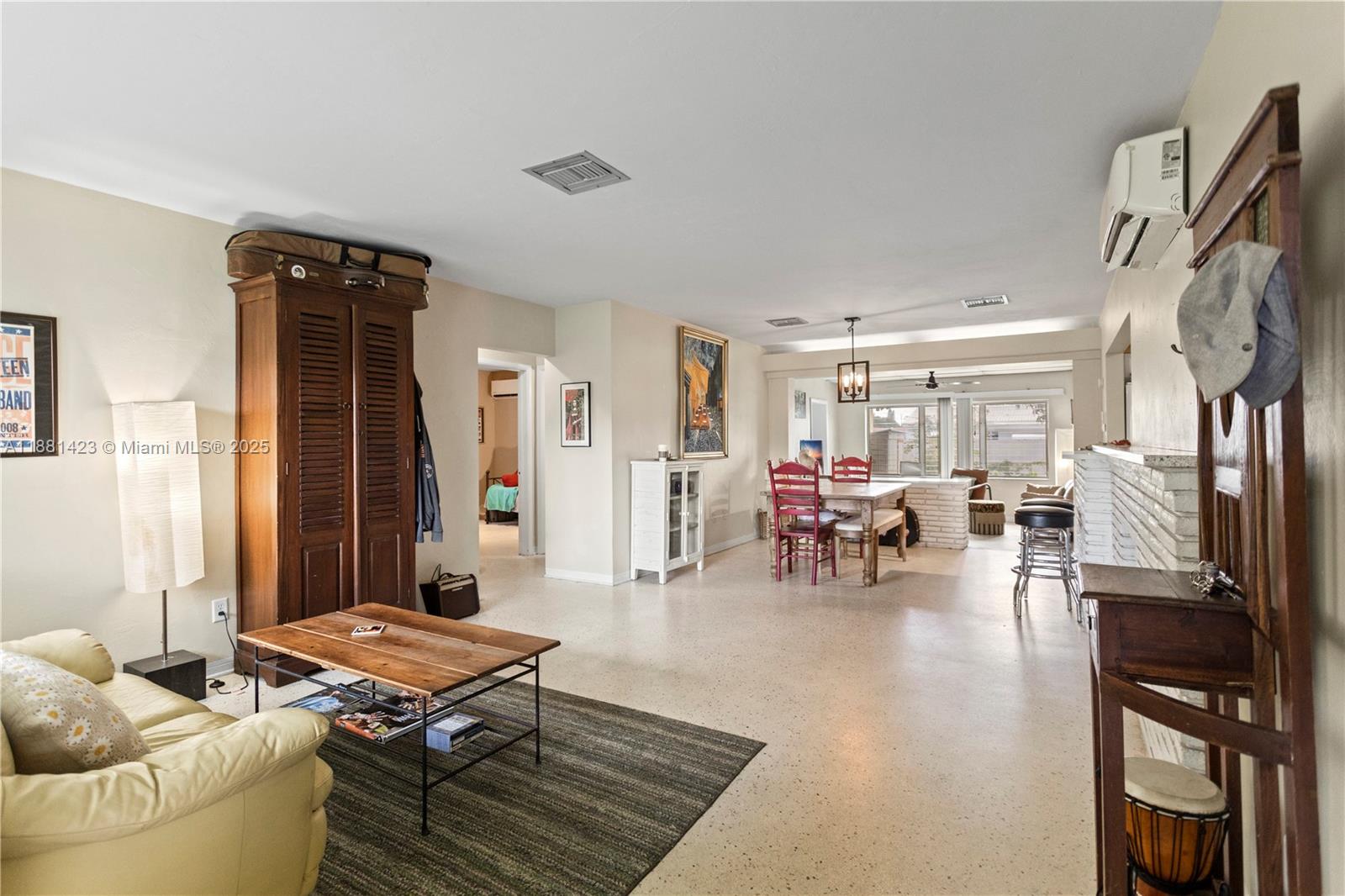 Amazing Home on the Heart of Hollywood Hills. This 3 Bedroom, 2 Bathroom home is immaculate with timneless, beautifully finished Terrazzo Floors, has Natural Gas to power the water heater, Stove/Range, and Fireplace in the Living Room. The home has a 4 Zone Mini Split AC/Heating System that can customize the temperature in each room. No need for driving, this home is located across the street from the Hollywood YMCA, The Yellow Green Farmers Market, a short walk to TY Park, Starbucks and next to Legendary Rotary Park as well as the new Hollywood Skate Park. Hollywood Hills has Great Schools is conveniently located to Great Shopping, Major Highways, Close to Hollywood Beach, Houses of Worship, and the Seminole Hard Rock Casino. One of the Best Priced Homes on the market!