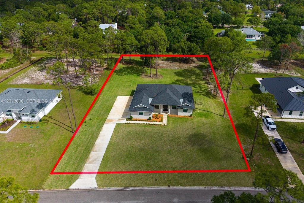 Photo of 10630 Sugar Pine Dr, Fort Pierce, FL 34945 (MLS # A12018000)