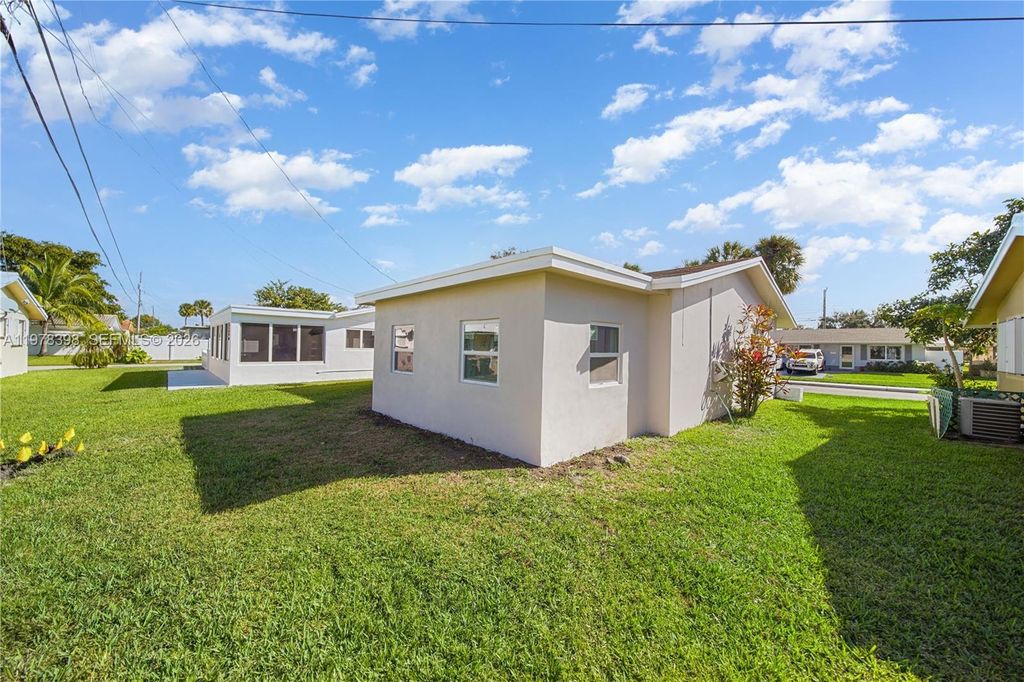 Photo of 2709 NW 54th St, Tamarac, FL 33309 (MLS # A11978398)