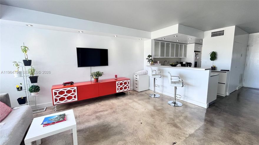 Special assessment is PAID! Welcome to Mirador 1000, where upon arrival, you'll step into a new lobby with 24-hour concierge services. #932 is a beautifully remodeled large studio with a Sunrise view through the impact windows. It features an open kitchen with modern, white cabinets, an updated bathroom with a shower, a double sink, and a large closet. The living area has a Murphy bed and two spacious closets. You'll have access to a range of luxurious amenities, including a new pool deck with a large heated pool, jacuzzi, and BBQ area overlooking the Best Sunset views. 5,00SF Fitness Center with Sauna and Cold Plunge. Store, hair salon, & massage. Near SOBE's premier dining, shopping, and entertainment. Parking is valet, or a parking spot can be rented/mo.