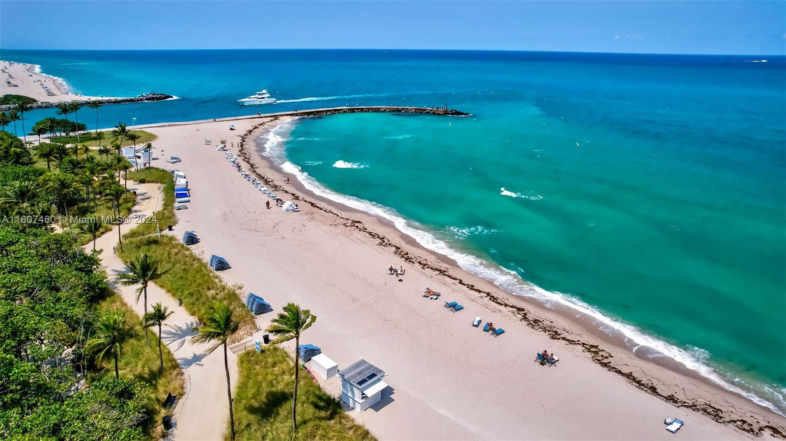 This two-bedroom, two-and-a-half-bathroom condominium offers approximately 1,462 square feet of living space. The property features direct access to the beachfront, with steps leading to the renowned Bal Harbour Shops, a premier shopping destination. A private oversized balcony provides residents with the opportunity to enjoy the picturesque surroundings. The spacious layout features a well-appointed primary bedroom suite, complete with an en-suite bathroom. The additional bedroom offers versatility, allowing residents to utilize the space as needed. The two-and-a-half bathrooms provide ample privacy and convenience.