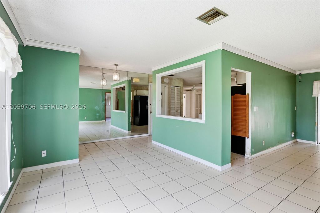 Photo of 1419 Hummingbird Dr, Delray Beach, FL 33444 (MLS # A12059706)