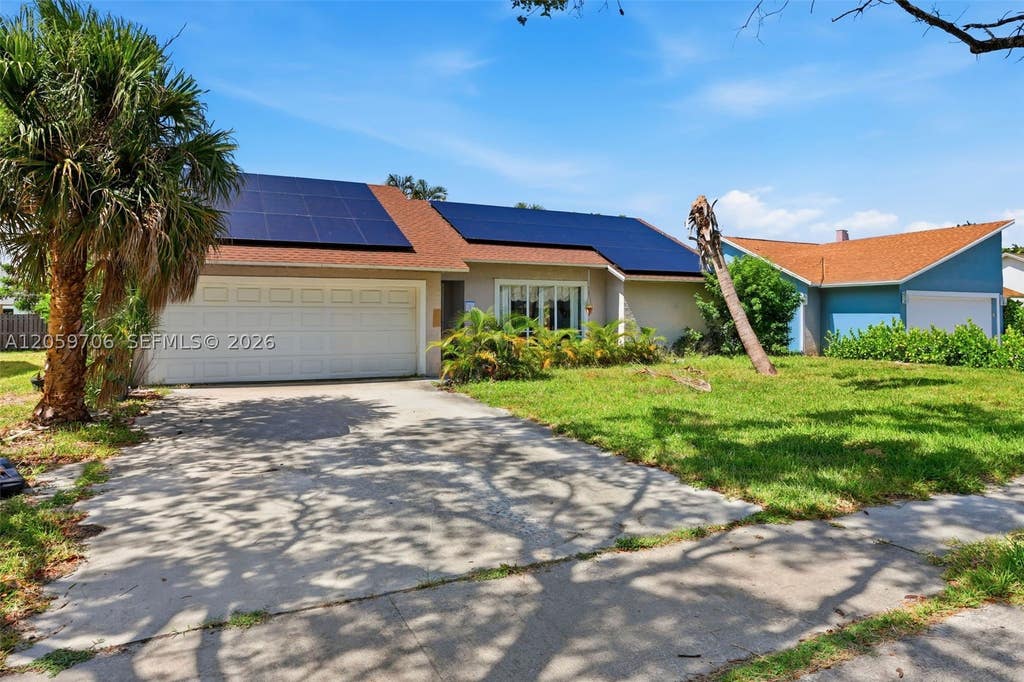 Photo of 1419 Hummingbird Dr, Delray Beach, FL 33444 (MLS # A12059706)