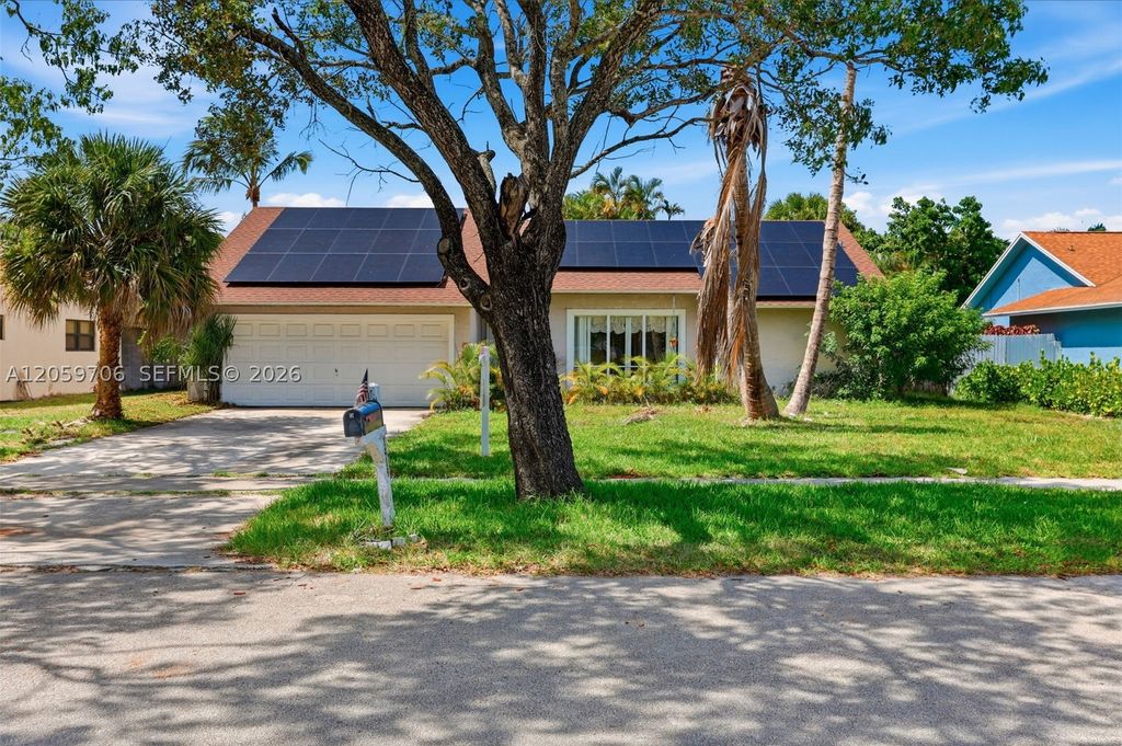 Photo of 1419 Hummingbird Dr, Delray Beach, FL 33444 (MLS # A12059706)