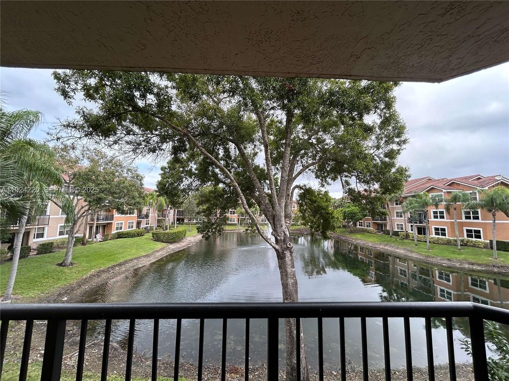 Photo of 8977 Wiles Rd #208, Coral Springs, FL 33067 (MLS # A11924220)