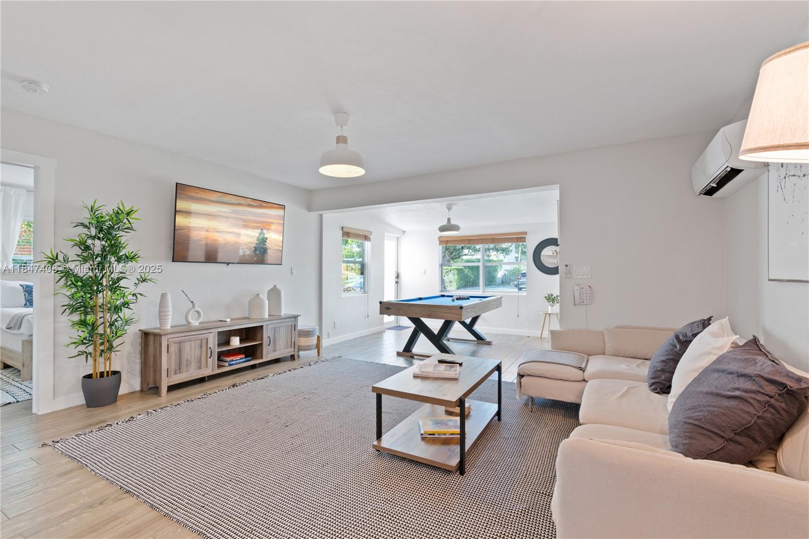 Step into this completely remodeled and fully furnished 1 bed, 1 bath apartment featuring sleek tile floors, stainless steel appliances, upgraded cabinetry, and recessed lighting. The spacious bedroom offers a generous closet, while the bright and airy layout creates a cozy yet modern feel. Enjoy the convenience of an in-unit washer and dryer located on the private patio. Centrally located just 10 minutes from Las Olas and the airport, this turnkey rental is available for short- or long-term leases. Comes with 2 parking spaces and rapid approval process.