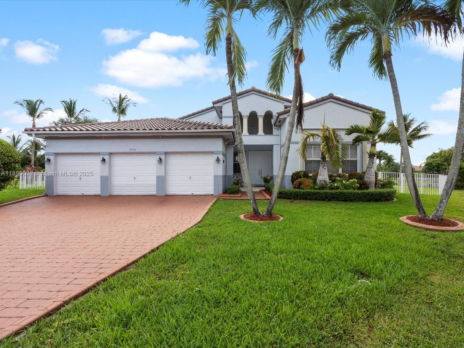Rare one-story home with a BRAND NEW ROOF in the gated community of Monarch Lakes sitting on the end of a cul-de-sac with an oversized 13,785 sq. ft. lot! A very practical and spacious home featuring high ceilings throughout, formal living and dining rooms, and an open eat-in kitchen with water views overlooking the spacious family room—ideal for entertaining. The backyard offers a pool, ample green space, and a peaceful lake scenery. A very private feel with only greens and water to enjoy! Accordion shutters throughout, laundry room, and a 3 car garage add to the feel of this luxury style home. Conveniently located near top-rated schools, parks, tennis courts, the Country Club of Miami golf course, Hard Rock Stadium, as well as dining, shopping, & entertainment.