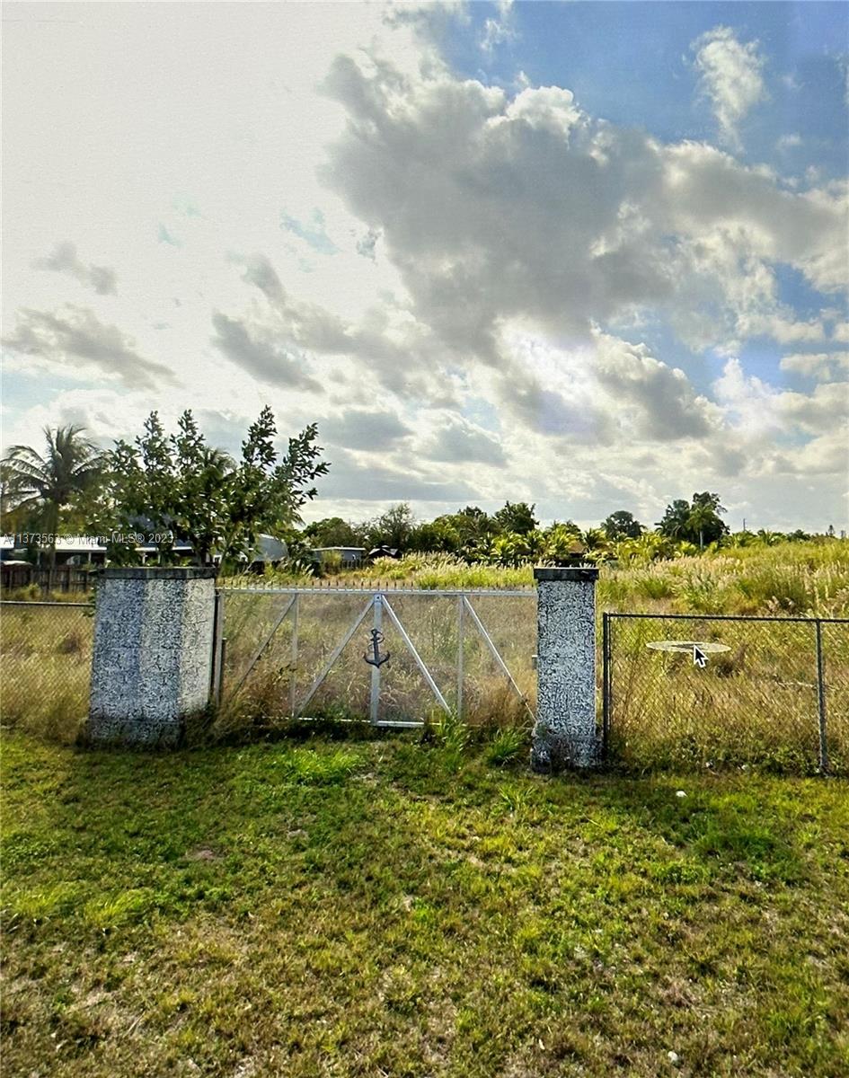 Great opportunity to own this piece of land in Miami-Dade, near the Redlands. The property is almost an acre in size. This vacant land is ready to have your dream home built, with little shrubbery and trees. This lot also has two wells and installed electrical. Due diligence was completed at time of purchase. Conveniently located close to US1, Publix supermarket, and FL Turnpike.