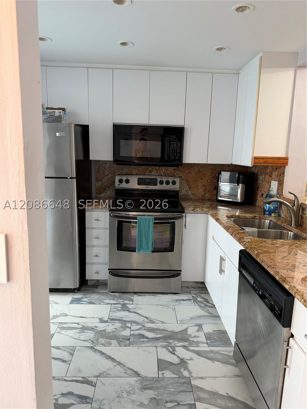 Photo of 320 NE 12th Ave #506, Hallandale Beach, FL 33009 (MLS # A12086648)