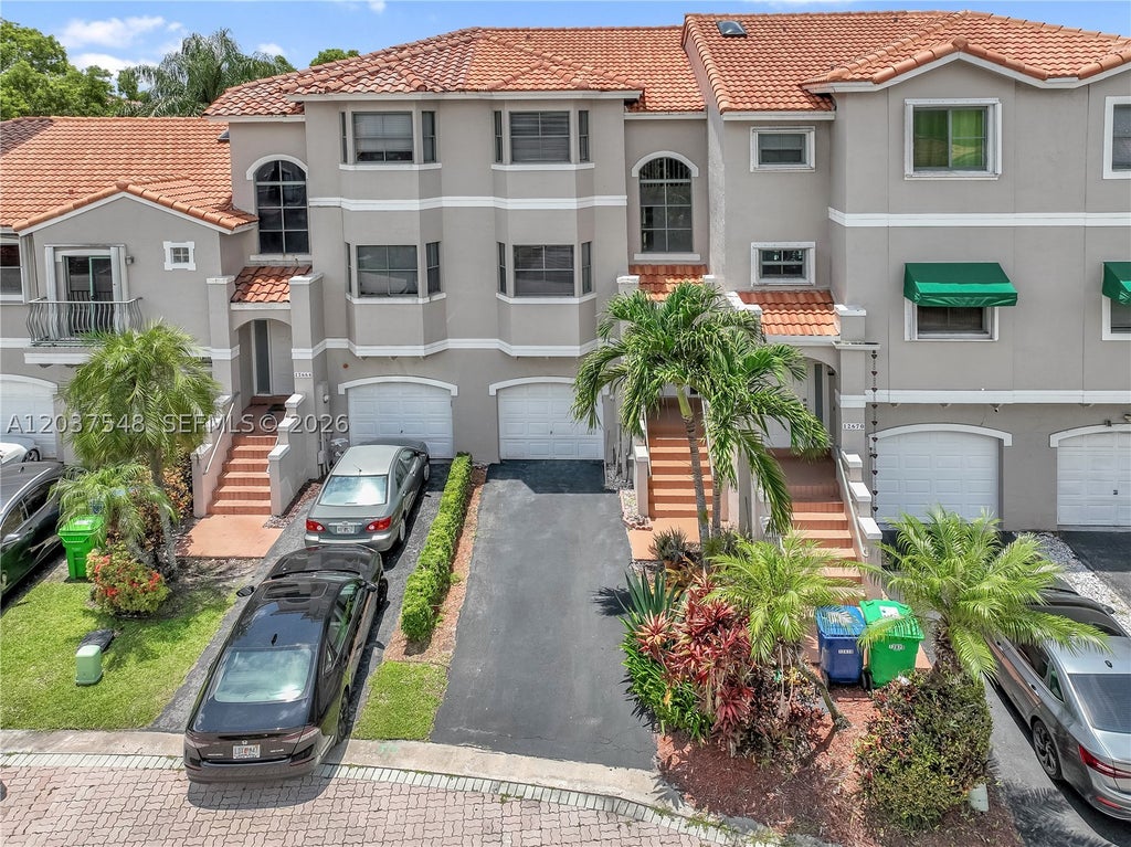 Photo of 12666 NW 14th Pl, Sunrise, FL 33323 (MLS # A12037548)