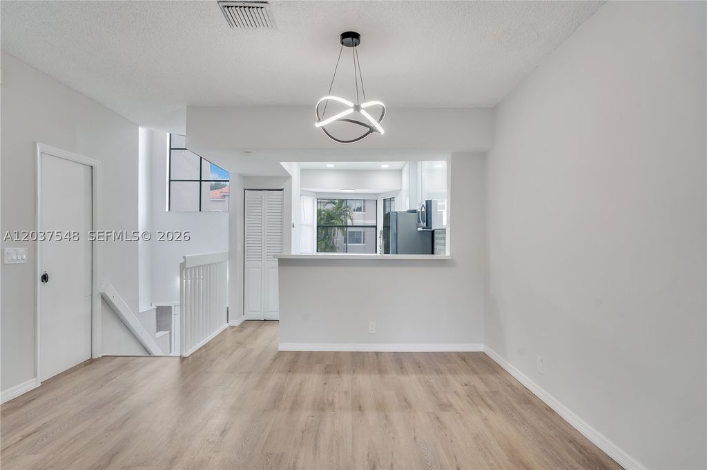 Photo of 12666 NW 14th Pl, Sunrise, FL 33323 (MLS # A12037548)