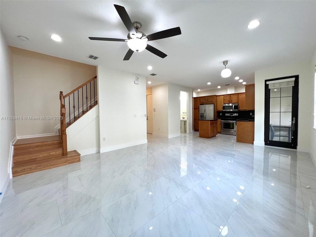 Photo of 3360 NW 125th Ave #3360, Sunrise, FL 33323 (MLS # A11329415)