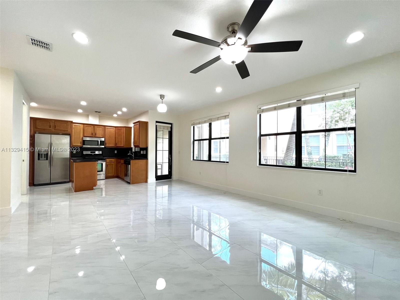 Beautiful Mediterranean Style Villa in resort living. This home features 3 bedrooms, 2.5 bathroom, 2-car garage, brand new floors