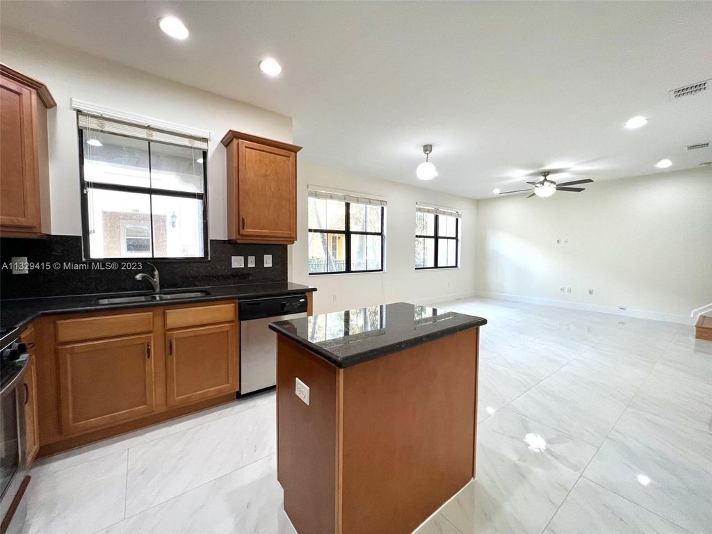 Photo of 3360 NW 125th Ave #3360, Sunrise, FL 33323 (MLS # A11329415)