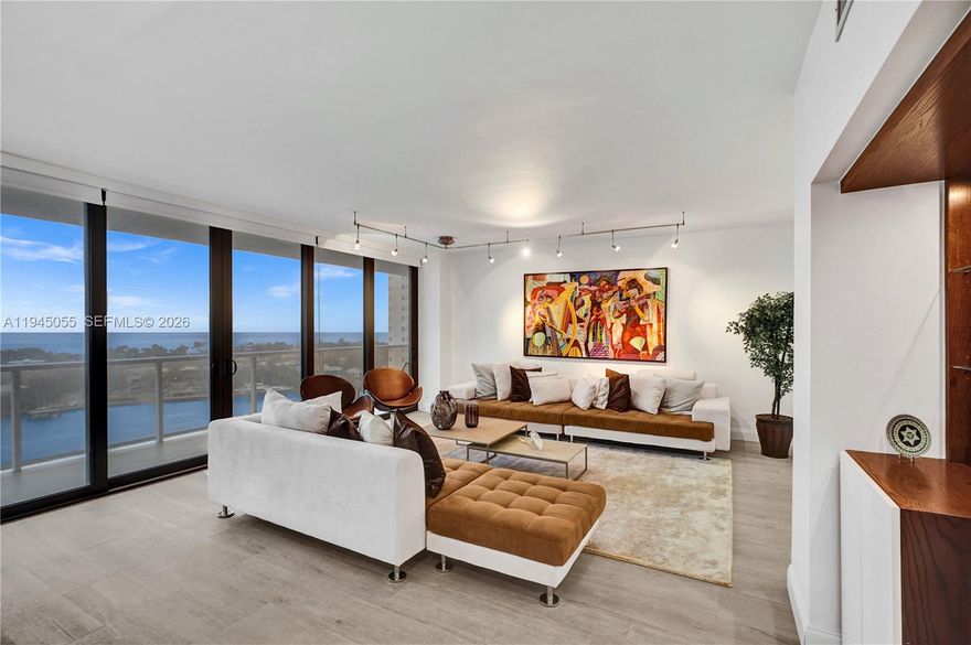 Discover stunning ocean, intracoastal, and Golden Beach views from this remarkable two-bedroom, two-bathroom residence that truly deserves a personal visit to appreciate its beauty. This property features high-end finishes, including LED lighting and sophisticated white marble in the foyer, kitchen and bathrooms. The living-dining room and bathrooms are adorned with wood-look porcelain tiles. The kitchen has stainless steel appliances, custom wood cabinetry, granite countertops and backsplash, generous storage options, and a breakfast nook that overlooks the waterways. The bathrooms are designed with modern custom cabinetry, glass-enclosed showers, and quartz countertops, combining elegance with practicality. Additional features include a washer and dryer, high-impact glass windows and doors, shades throughout, blackout in the bedrooms and two expansive balconies for outdoor relaxation.

Residents can indulge in luxury living at The Hamptons, one of the few buildings in Aventura with a few years that the Budget has fully funded reserves. Offering two swimming pools, a private gourmet restaurant seating over 200 people, the Wi-Fi Hamptons Café, a movie theater, a state-of-the-art fitness center, and spa, as well as tennis and racquetball courts, party rooms, children's areas, and much more. Enjoy strolls in “the circle” and take advantage of the proximity to beaches, restaurants, shopping, A+ schools, and houses of worship.