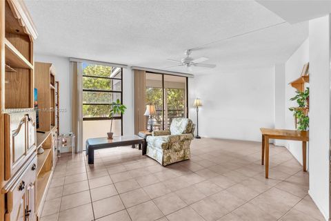 Photo of 20400 NE Country Club Dr #215, Aventura, FL 33180 (MLS # A11838273)