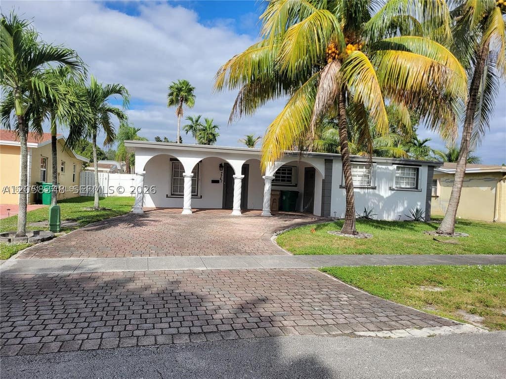 Photo of 7761 NW 41st St #7761, Hollywood, FL 33024 (MLS # A12058348)