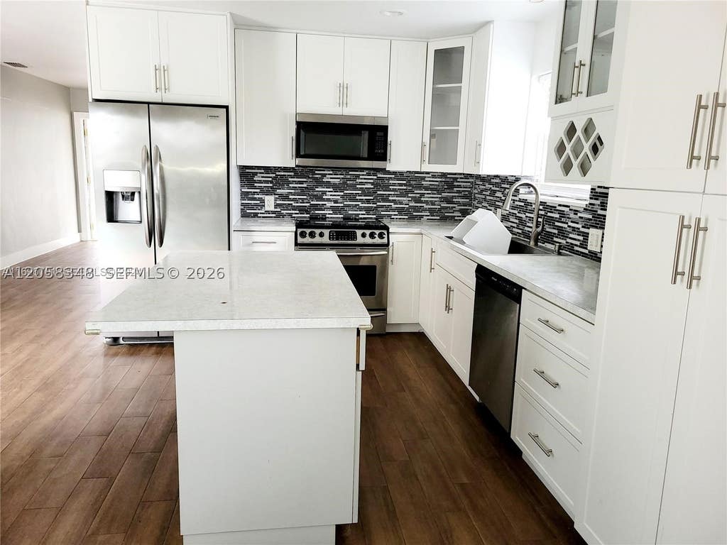 Photo of 7761 NW 41st St #7761, Hollywood, FL 33024 (MLS # A12058348)