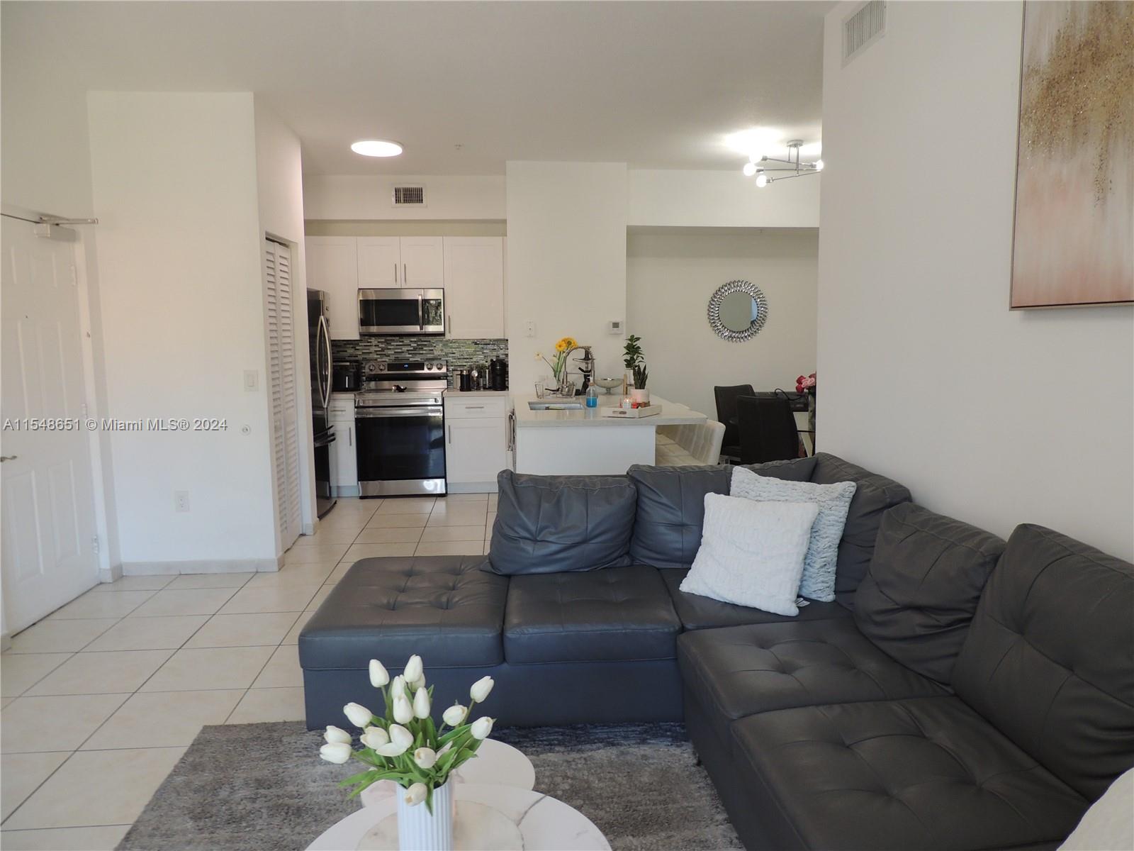 PALM GARDENS AT DORAL CON - Residential Lease