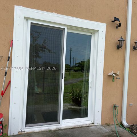 Tiny photo for 17820 NW 73rd Ave #103-1, Hialeah, FL 33015 (MLS # A12047555)