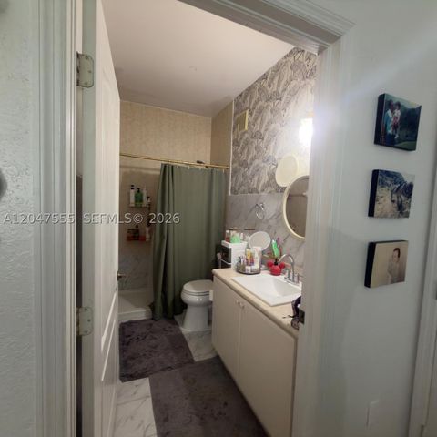 Tiny photo for 17820 NW 73rd Ave #103-1, Hialeah, FL 33015 (MLS # A12047555)